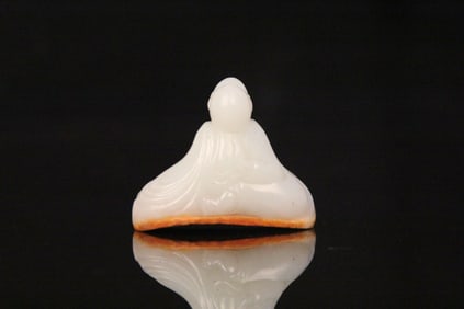 A Chinese Carved Jade Figure of Buddha