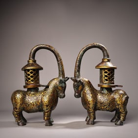 A Pair of Chinese Bronze and Gold-Inlaid Bull-Shape Lamps