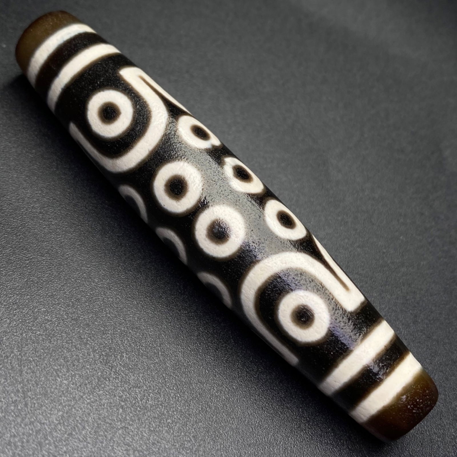 A Chinese Carved Agate DZI Bead (1 of 9)