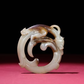 A Chinese Carved Jade Dragon Ring Pendant
