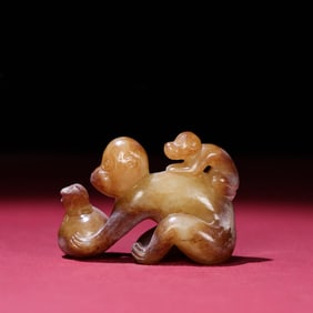A Chinese Carved Jade Monkeys Statuette