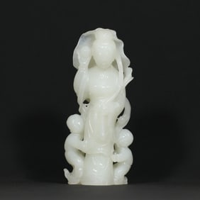 A Chinese Carved Jade Figure of Buddha and Boys