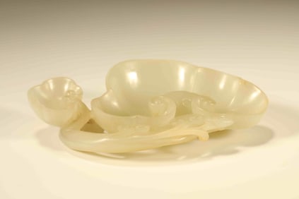 A Chinese Carved Jade Ruyi Brush Paste