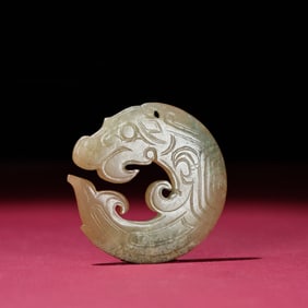 A Chinese Carved Jade Dragon Pendant