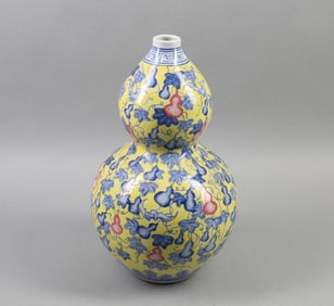 A Chinese Yellow Ground Glazed Double Gourd Porcelain Vase