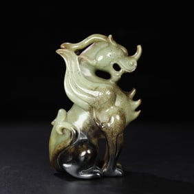 A Chinese Carved Jade Dragon Statuette