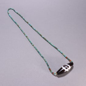 A Chinese Carved Agate DZI Bead
