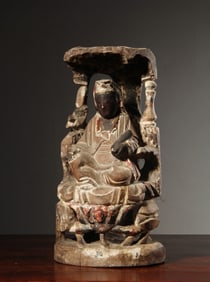 A Chinese Carved Hardwood Figure of Buddha