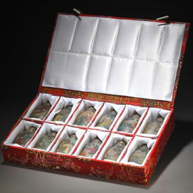 A Set of Chinese Carved Peking Glass Snuff Bottles