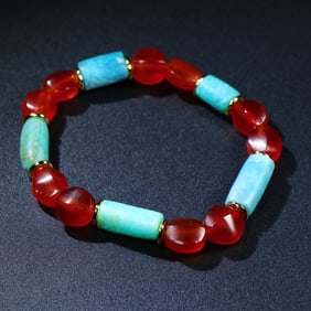 A Chinese Carved Agate Bracelet