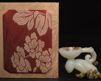 A Chinese Carved Jade Kneeling Man Lamp