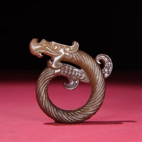 A Chinese Carved Jade Dragon Ring Pendant