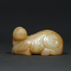 A Chinese Carved Jade Foo-Dog Statuette