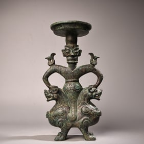 A Chinese Bronze Figure of Man Lamp