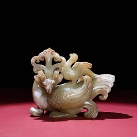 A Chinese Carved Jade Phenix Statuette