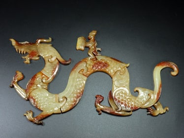 A Chinese Carved Jade Dragon Pendant