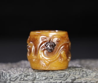 A Chinese Carved Jade Ring