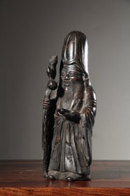A Chinese Tin Figure of Buddha
