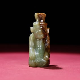 A Chinese Carved Jade Figure of Kneeling Officer