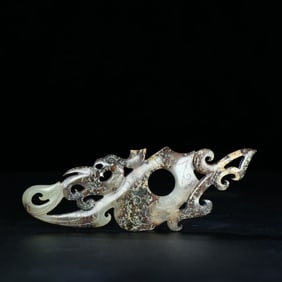 A Chinese Carved Jade Dragon and Phenix Pendant