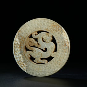 A Chinese Carved Jade Dragon Pendant