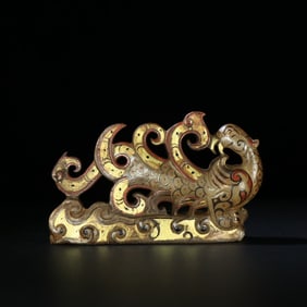 A Chinese Carved Jade Phenix Statuette