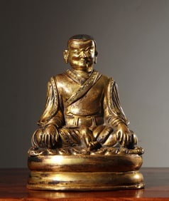 A Chinese Gilt Bronze Figure of Buddha
