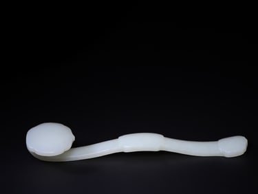A Chinese Carved Jade Ruyi