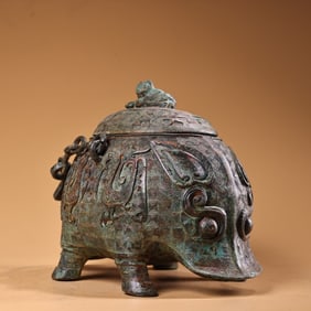A Chinese Bronze Jar with Handle and Lid