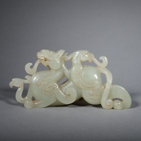 A Chinese Carved Jade Dragon and Phenix Statuette