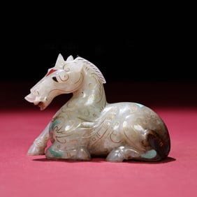 A Chinese Carved Jade Horse Statuette