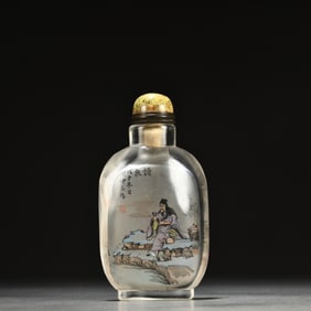 A Chinese Carved Peking Glass Snuff Bottle