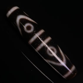 A Chinese Carved Agate DZI Bead