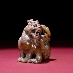 A Chinese Carved Jade Bear Statuette