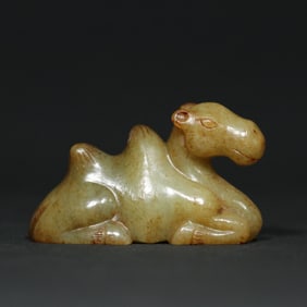 A Chinese Carved Jade Camel Statuette