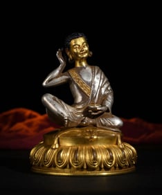 A Chinese Gilt Bronze Figure of Buddha