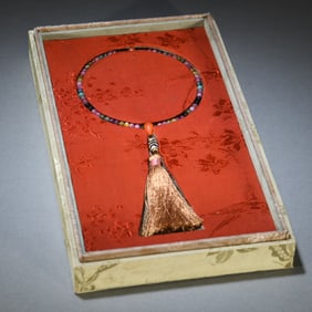 A Chinese Carved Tourmaline Prayer Beads