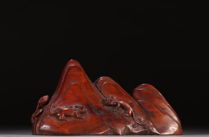 A Chinese Carved Hardwood Dragon Boulder Decoration