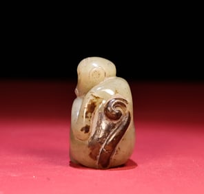 A Chinese Carved Jade Monkey Statuette