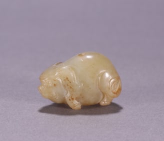 A Chinese Carved Jade Pig Statuette