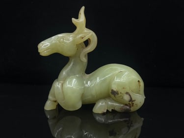 A Chinese Carved Jade Deer Statuette