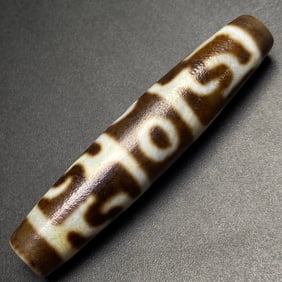 A Chinese Carved Agate DZI Bead
