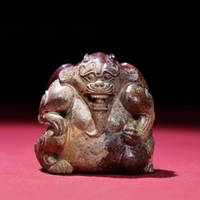 A Chinese Carved Jade Bear Statuette