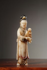 A Chinese Carved Stone Figure of Buddha