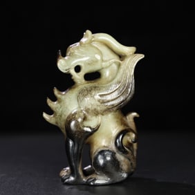 A Chinese Carved Jade Dragon Statuette