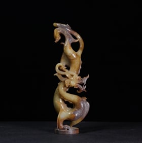 A Chinese Carved Jade Dragon Statuette