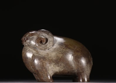 A Chinese Carved Jade Goat Statuette