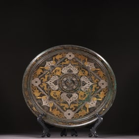 A Chinese Bronze Mirror