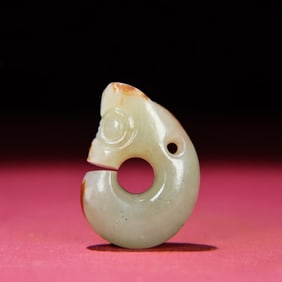 A Chinese Carved Jade Dragon Pendant