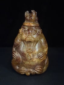 A Chinese Carved Jade Bear Vase